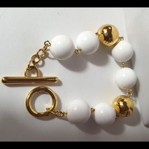 Monet bracelet gold tone and white beads